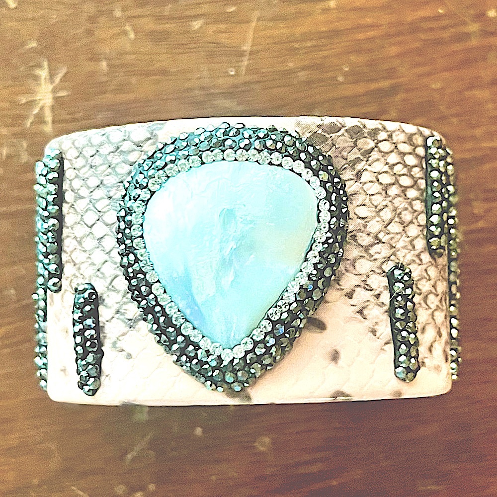 BLUSH COLORED FAUX LEATHER WIDE CUFF BRACELET